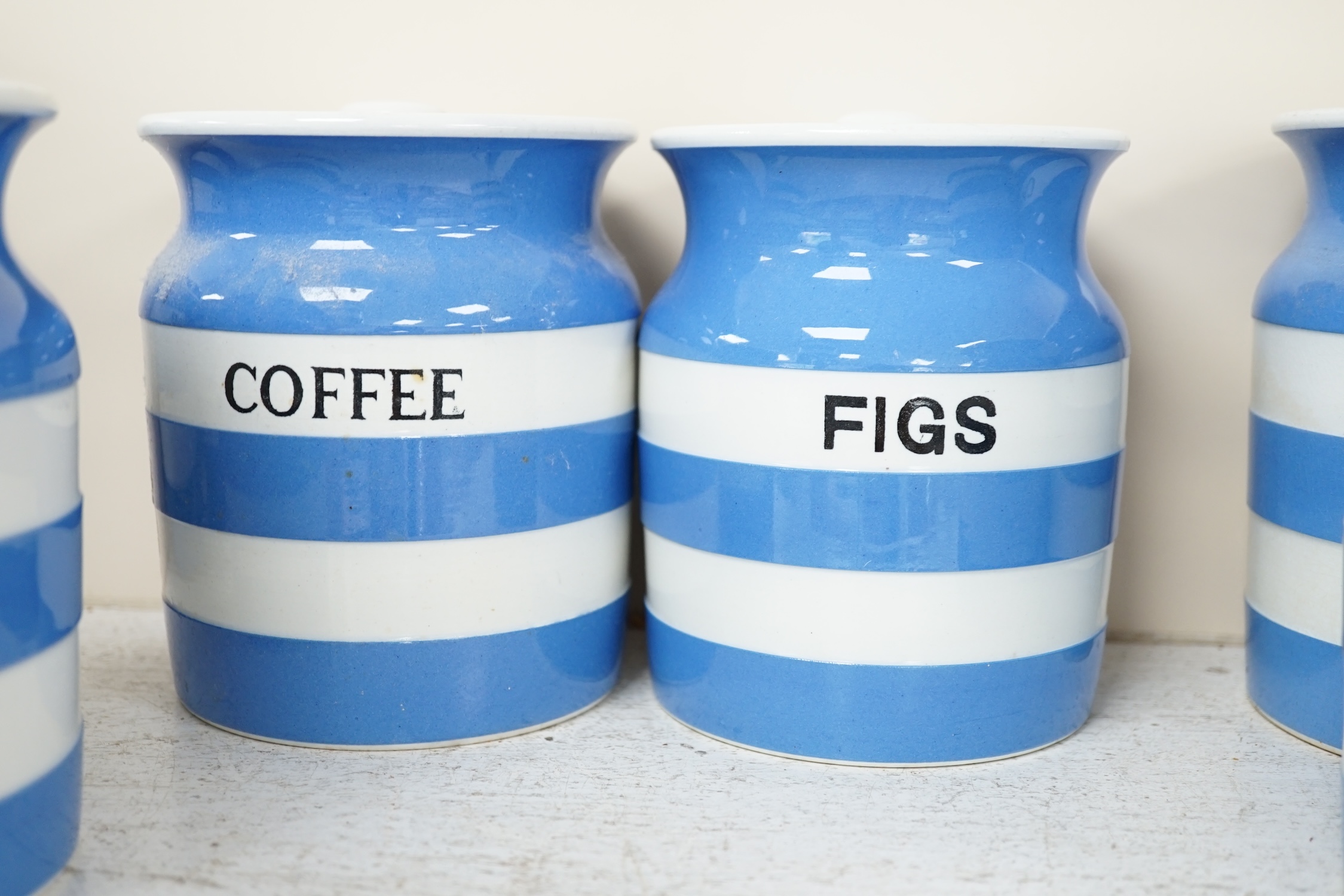 T.G.Green Cornish Kitchenware, nine 14cm lidded storage jars, comprising Pearl Barley, Coffee, Loaf Sugar, Figs, Apricots, Caster Sugar, Cocoa Nut, Coffee Sugar and Ground Rice, together with a 13.5cm Chocolate lidded st